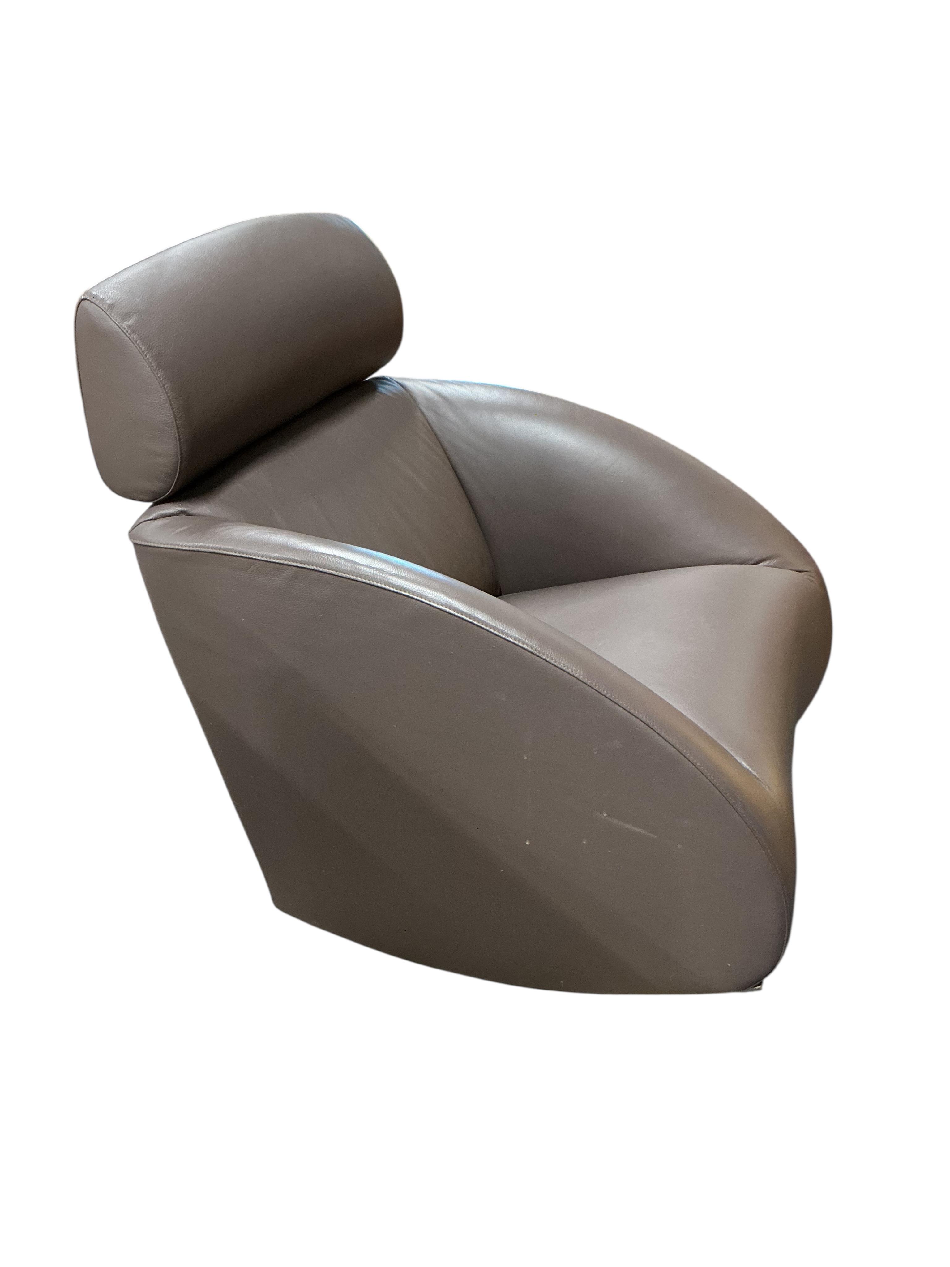 A Contemporary brown leather rocking chair, width 76cm, depth 88cm, height 90cm